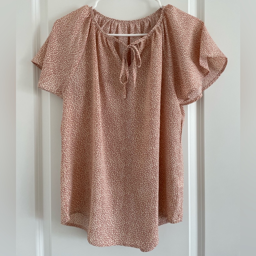 Fawn flutter sleeve blouse with tie detail neckline